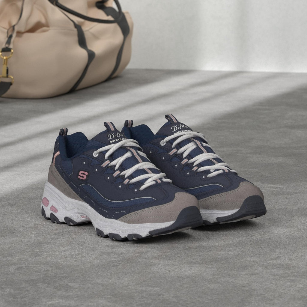 Skechers Women's Skech-AIR Dynamight Sneaker, Navy White, 9.5