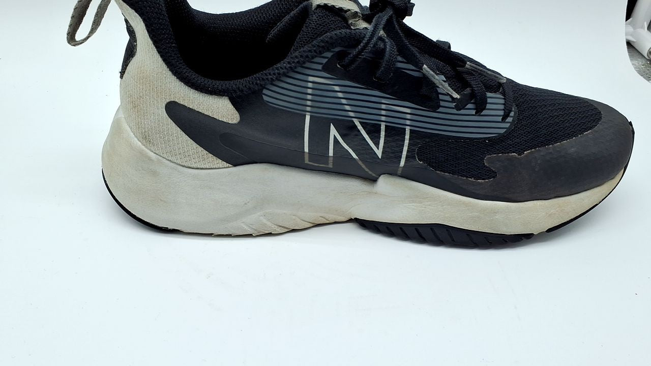 New Balance Kid's Rave Run V2 Lace-up Shoe, Black/White, 6.5 Wide Big Kid