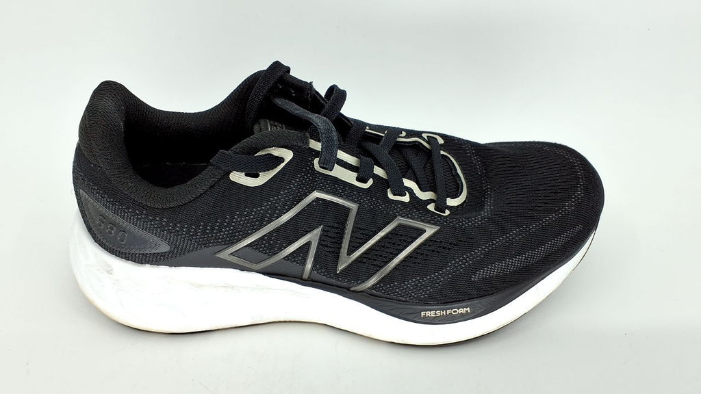 New Balance Women's 680 V8 Running Shoes, 8.5W, Black/Light Gold Metallic