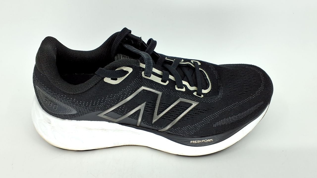New Balance Women's 680 V8 Running Shoes, 8.5W, Black/Light Gold Metallic